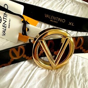 Valentino: Genuine leather black belt with baby monogram. Size XL Gold hardware